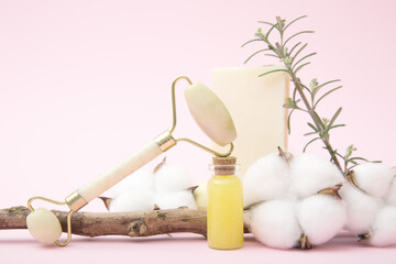 Natural Skincare Composition with Jade Roller and Cotton. Concept of beauty routine, self-care, and...