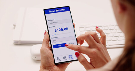 The Young Woman Is Checking Her Mobile Banking Account