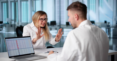 Fototapeta premium Doctors Argue Over Treatment Plan During Hospital Staff