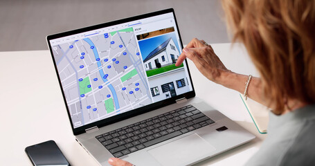 Senior Real Estate Agent Helps Woman Navigate Online Property