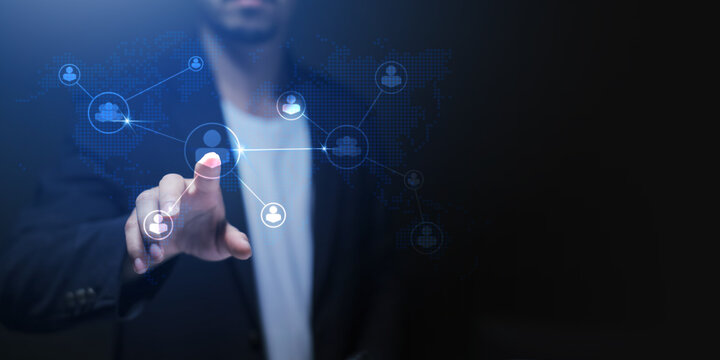 A man is using a smartphone and tablet to social network connection and communication people icon. Human connection, social network, global business and communication technology background design. 