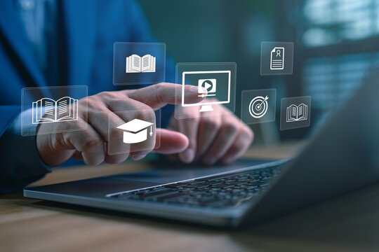 E-learning and digital education concept. Businessman using online learning platforms with icons of books, graduation cap, video course and certificate. Virtual learning and modern teaching tools.