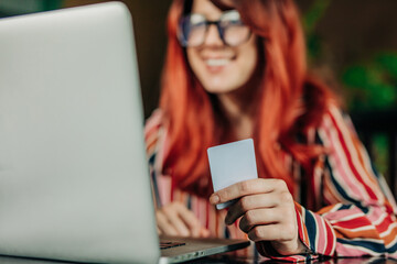 Redhead European Woman Shopping Online with Credit Card