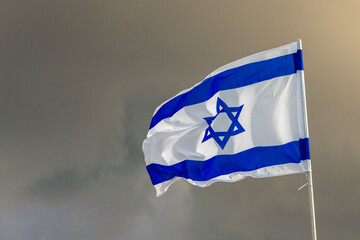 Israeli Flag waving in the wind, Tel Aviv, Israel