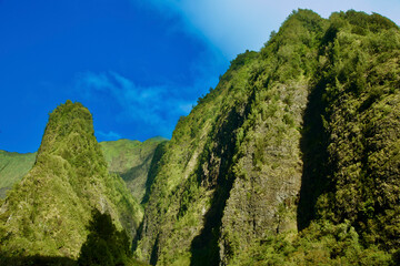 Majestic green mountains under a clear vivid blue sky. Iao valley, Wailuku, Iao needle, Maui, Hawaii
