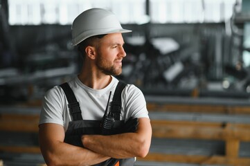 portrait of a confident worker in a factory