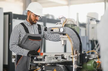 PVC industry worker or operator making frames for windows and doors