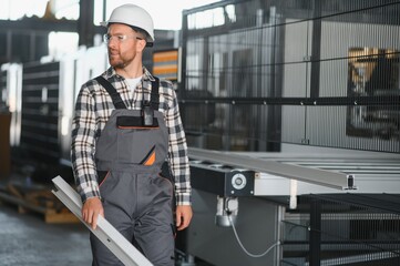 portrait of a confident worker in a factory