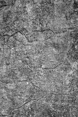 Close-up of coarse stone texture with rugged, detailed surface.Perfect for backgrounds,interior design,architecture,and marketing projects needing a natural,durable,and gritty element