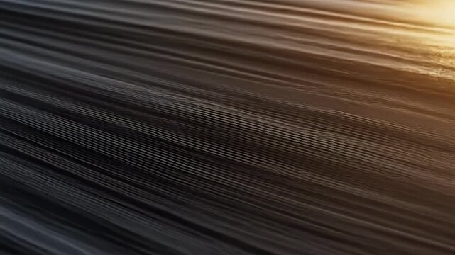 Abstract Texture with Parallel Black Lines on a Shiny Surface Reflecting Light Creating a Metallic Futuristic Motion Style