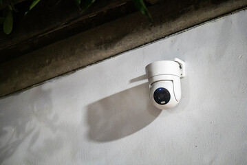 Security Camera Mounted on Wall at Night