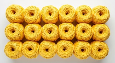 organized balls of yellow yarn, background pattern, knitting and crafting graphic