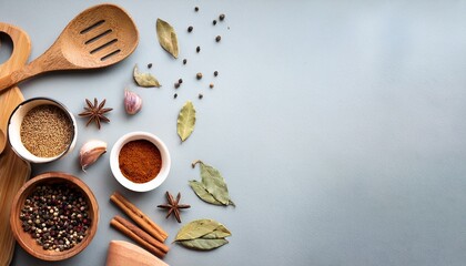 flat lay of cooking utensils and spices on blank background ideal for culinary or recipe content