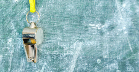whistle of soccer referee or trainer with scribble on blackboard .Shallow depth of field with nice...