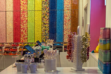 Various flavors of marmalade, candies and nuts by weight in a sweets boutique