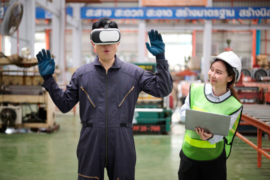 Engineer or technician wearing virtual reality glasses(VR) in containers warehouse storage