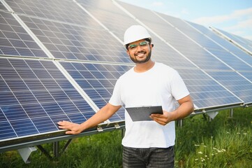 Indian Engineer near solar panel