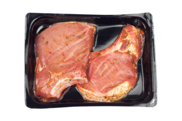 marinated steak in vacuum packaging, isolated from the background