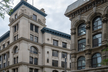 Obraz premium Facade of two stone buildings located in Old Montreal 