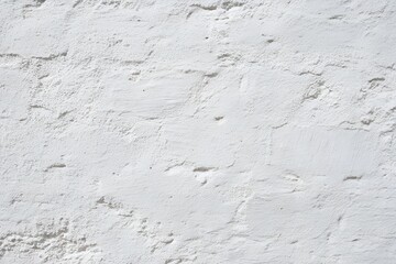 Obraz premium Closeup texture of a weathered white painted brick wall with visible cracks and imperfections
