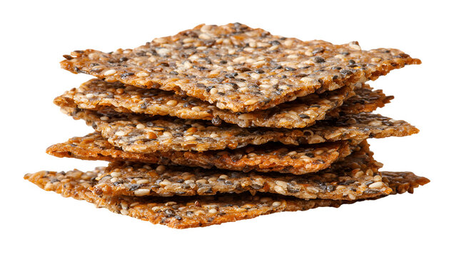 Stack of healthy whole grain seed crackers isolated on transparent background