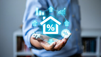 Conceptual image showcasing real estate interest rates and market trends presented in a futuristic digital interface with a man holding the holographic projection in his palm