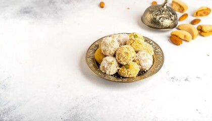 A decorative metal plate holds a collection of sweet treats, showcasing a variety of textures and colors.