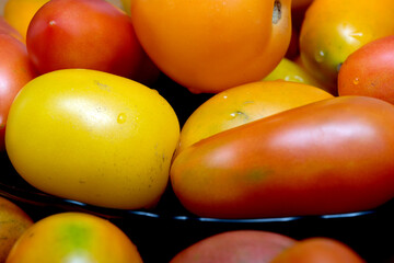 Colorful assortment of ripe tomatoes in a vibrant display