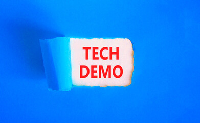 Tech demo symbol. Concept word Tech demo on beautiful white paper. Beautiful blue paper background....