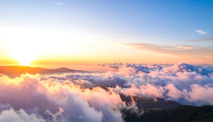 A breathtaking sunrise view over a vast expanse of clouds and mountains, showcasing soft pastel colors and a tranquil atmosphere.
