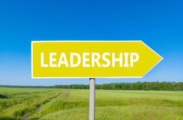 Leadership symbol. Concept word Leadership on beautiful yellow road sign. Beautiful blue sky green grass and forest peaceful nature background. Business leadership concept. Copy space.