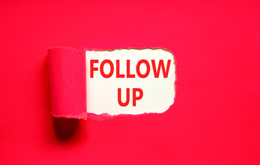 Follow up symbol. Concept word Follow up on beautiful white paper. Beautiful red paper background....