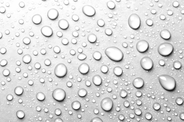Realistic water droplets on a white or transparent background