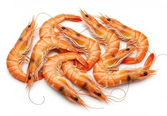 Pile of cooked orange shrimp with long, thin antennae on a stark white surface