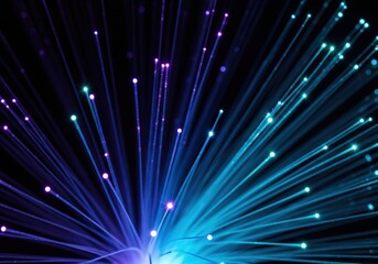 Naklejka premium Close-up glowing fiber optic threads sparkle in deep indigo and cyan light