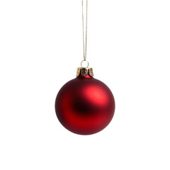 Shiny red Christmas ornament hangs elegantly, reflecting light and creating festive atmosphere