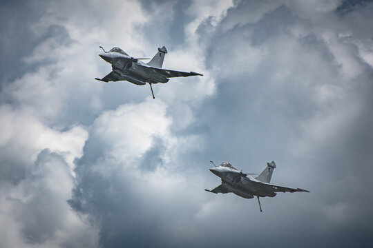 Two French Navy Rafale fighter jets flying in formation