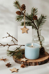 star blue bottle paper notebook wood winter snowflake pinecone candle pine tree decoration frame photos greeting cards mockup photo E-commerce marketing poster Background shooting scene