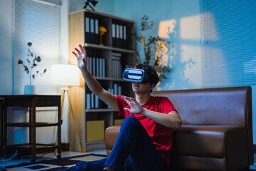 Teenage gamer immersing in virtual reality, navigating digital landscapes with VR headset while...