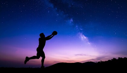 A silhouette of a person catching a ball against a vibrant night sky filled with stars and the Milky Way.