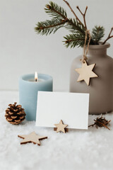 star blue bottle paper notebook wood winter snowflake pinecone candle pine tree decoration frame photos greeting cards mockup photo E-commerce marketing poster Background shooting scene