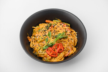noodles with microgreens and pepper on a white background