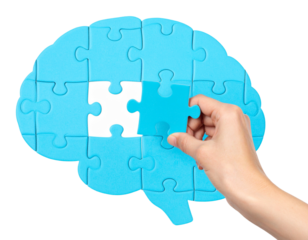 Hand Placing Colorful Puzzle Piece into Brain-Shaped Puzzle, Top View, Transparent Background