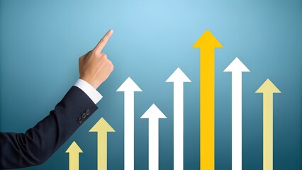 Hand pointing upward toward colorful rising arrows on blue background – Progress Concept, Business, Motivation, Abstract, Strategy, Success