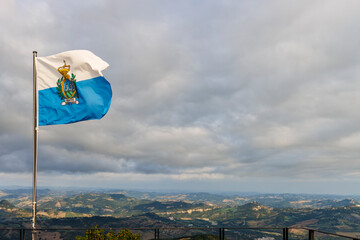 Flag of the Republic of San Marino and the landscape of San Marino, Europe