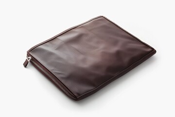 Fototapeta premium Stylish brown leather pouch sits on a white background showcasing its sleek design and practical use for organizing essentials