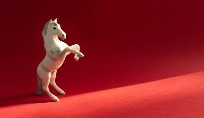 White horse on a red background, year of horse 2026