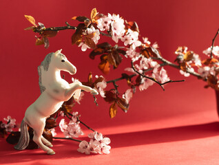 White horse with plum flowers around it, celebration of the Chinese New Year 2026