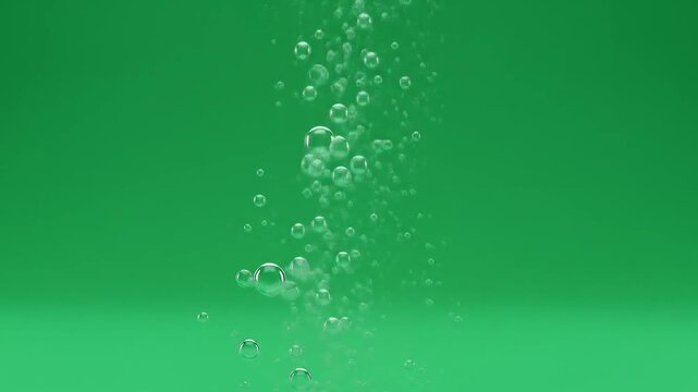 Bubbles rising against a vibrant green background.