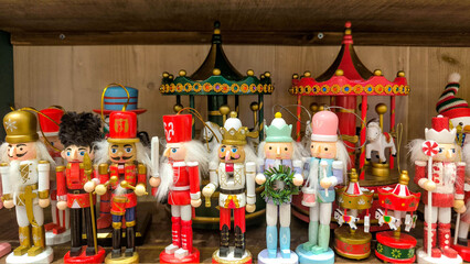 Wooden nutcracker soldier figurines in festive, displayed as Christmas holiday decorations, symbolizing tradition, joy, and seasonal charm.